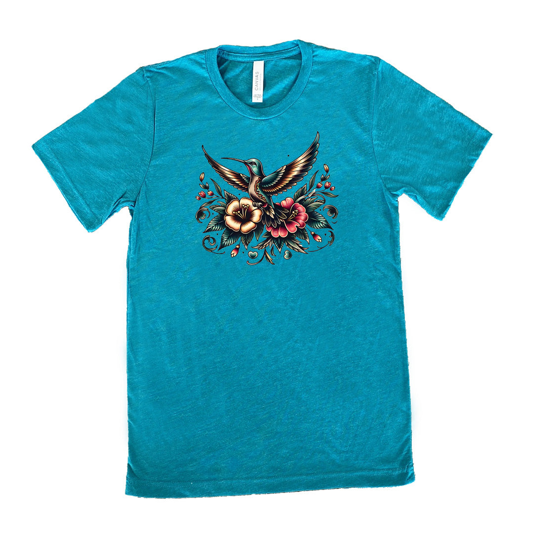 teal shirt with a hummingbird graphic on it