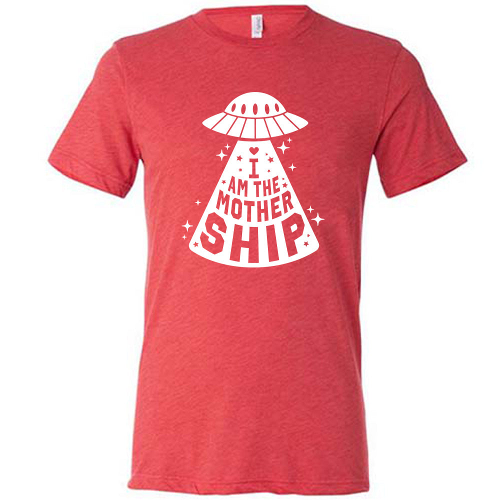red unisex tee with the words "I am the mothership" on it within the beam of a UFO, with a heart above the words, and a number of stars scattered around