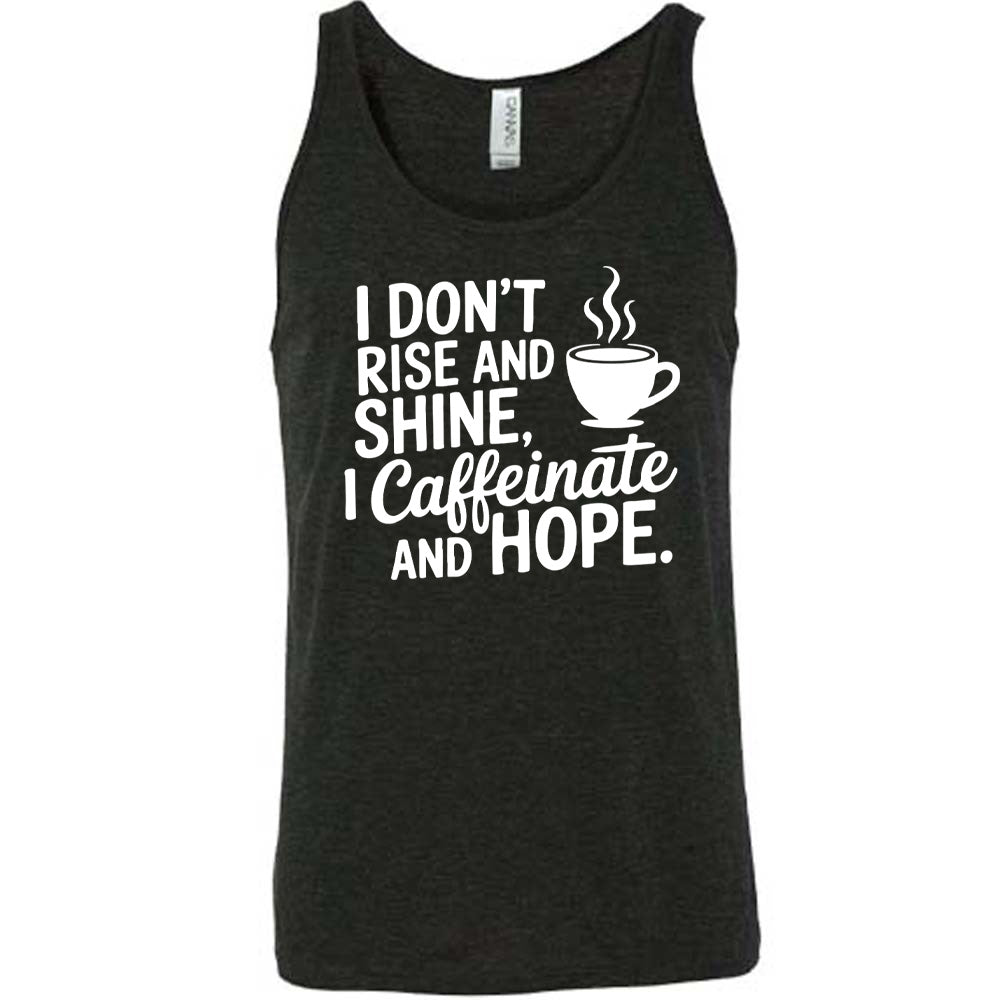 black unisex tank with the words "I don't rise and shine, I caffeinate and HOPE." on it, with the graphic of a steaming cup of a coffee