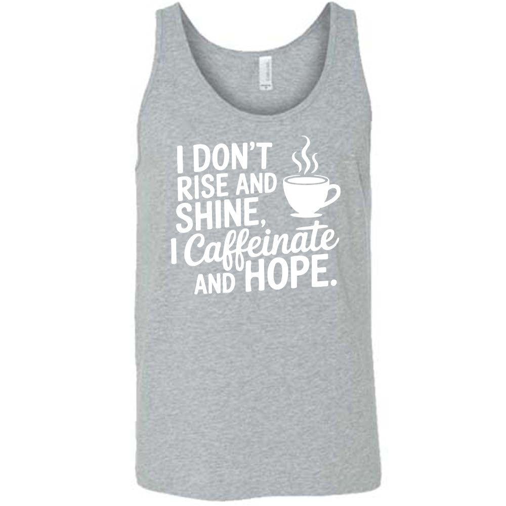 grey unisex tank with the words "I don't rise and shine, I caffeinate and HOPE." on it, with the graphic of a steaming cup of a coffee