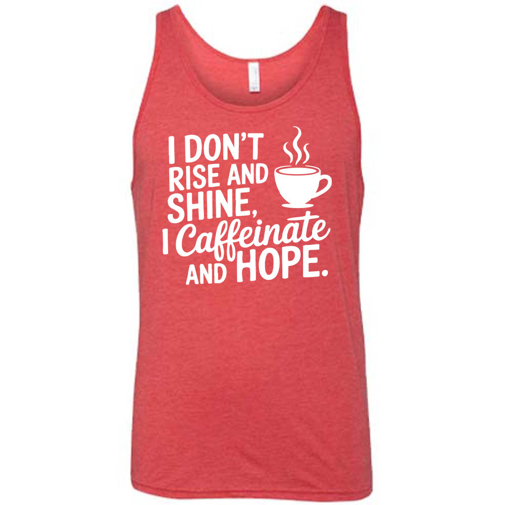 red unisex tank with the words "I don't rise and shine, I caffeinate and HOPE." on it, with the graphic of a steaming cup of a coffee