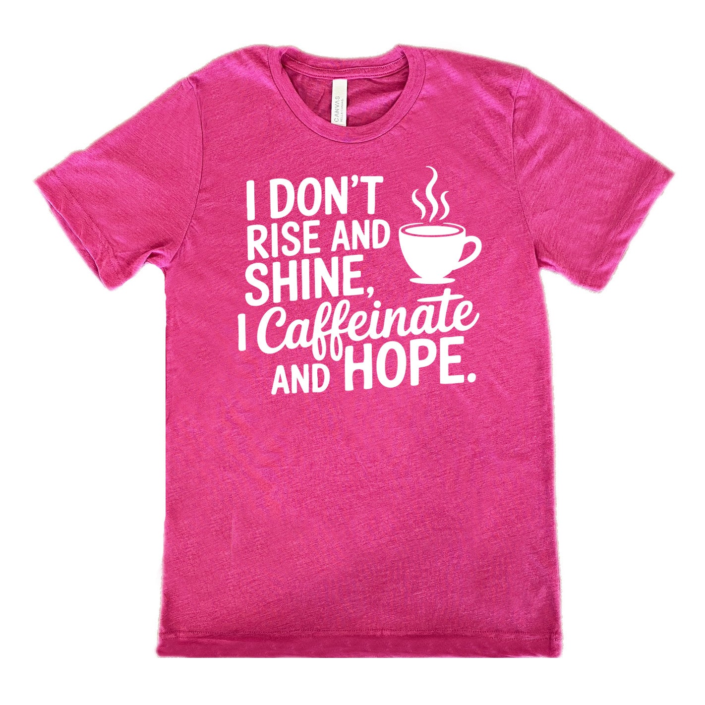 berry unisex tee with the words "I don't rise and shine, I caffeinate and HOPE." on it, with the graphic of a steaming cup of a coffee