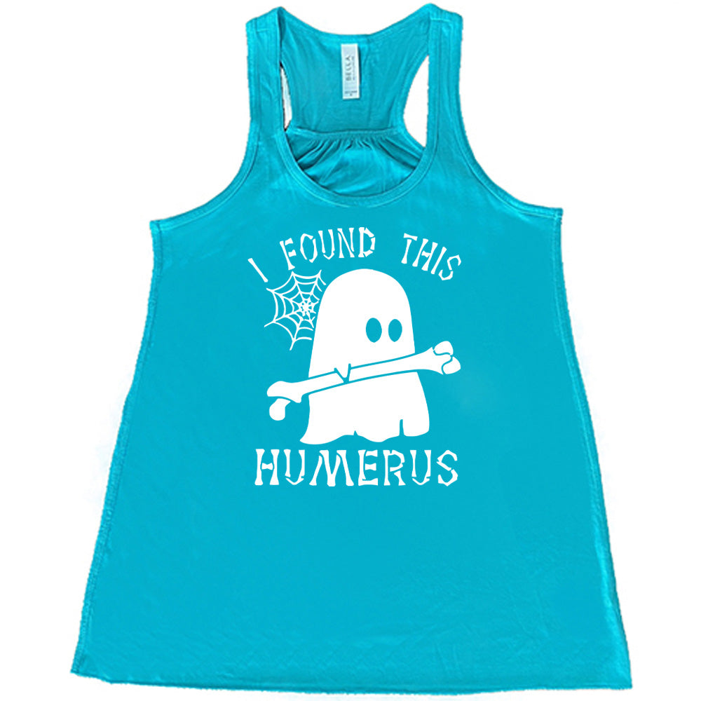 Teal colored flowy tank with ghost holding a bone graphic on it that says "I Found This Humerus"