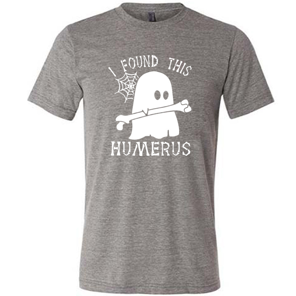 Grey colored shirt with ghost holding a bone graphic on it that says "I Found This Humerus"