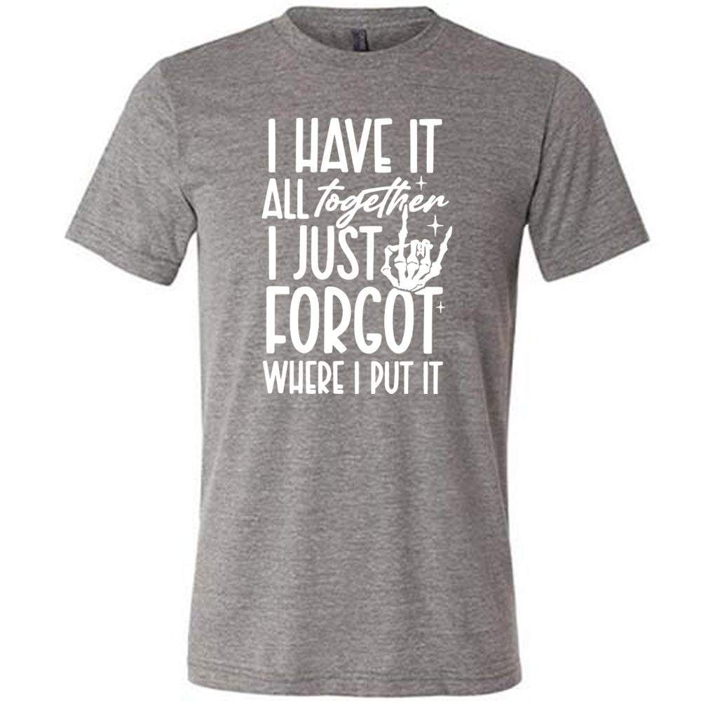 grey unisex tee with the words "I have it all together I just forgot where I put it" on it, with the graphic of a rocker hand and a few little stars