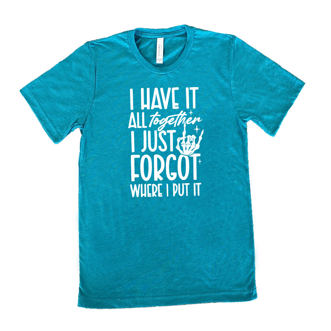 teal unisex tee with the words "I have it all together I just forgot where I put it" on it, with the graphic of a rocker hand and a few little stars