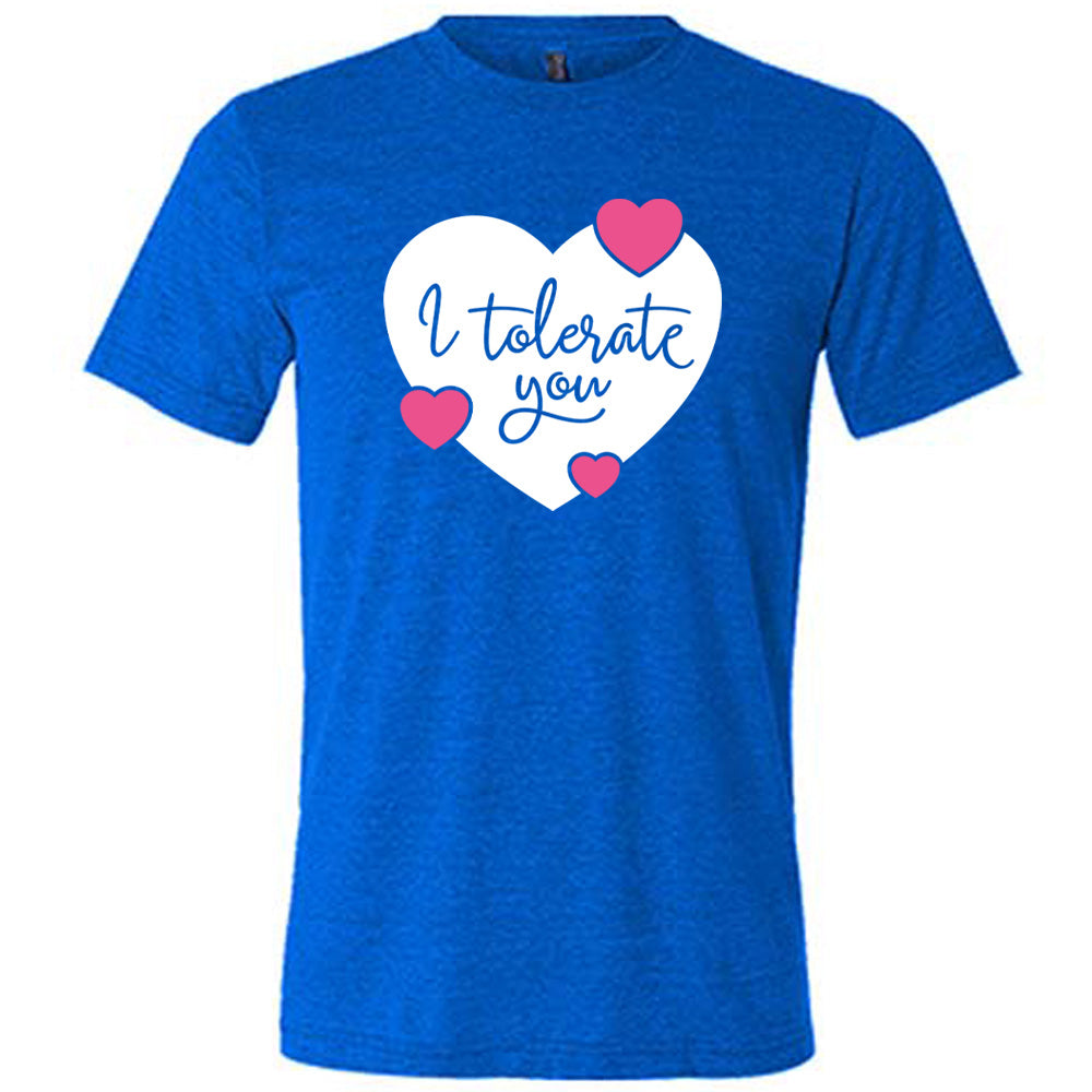 blue unisex tee with the words "I tolerate you" in blue lettering on it, within a white heart graphic that has three small pink hearts overlapping on its edges 