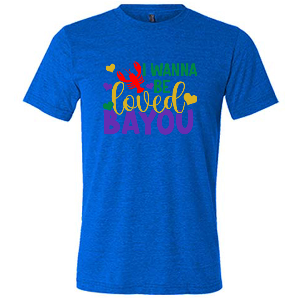 blue unisex tee with the words "I wanna be loved bayou" on it in varied fonts, with the small graphics a few hearts and one lobster