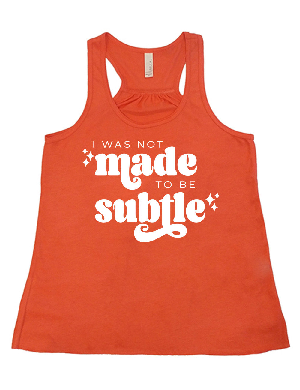 coral flowy racerback tank with the words "I was not made to be subtle" on it, with a few stars embellishing