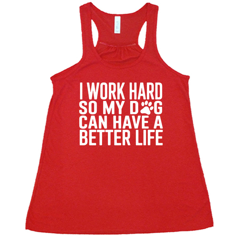 Red colored flowy tank with paw print graphic on it that says "I Work Hard So My Dog Can Have A Better Life"