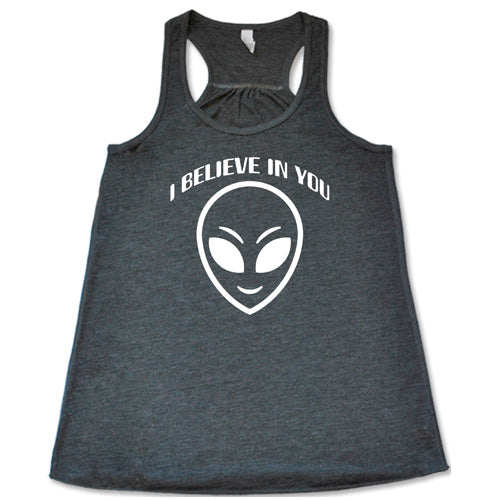 grey racerback tank top with a "I believe in you" quote and alien head design on it