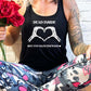 model wearing a black tank top with the saying "Dead Inside But It's Valentine's Day" in white