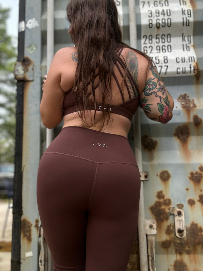 model wearing the solid light brown full length leggings and cami top