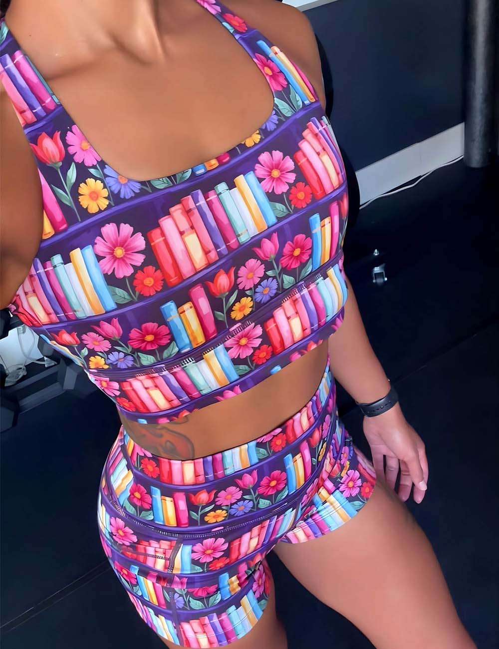 Multicolored floral and bookshelf set on a person.