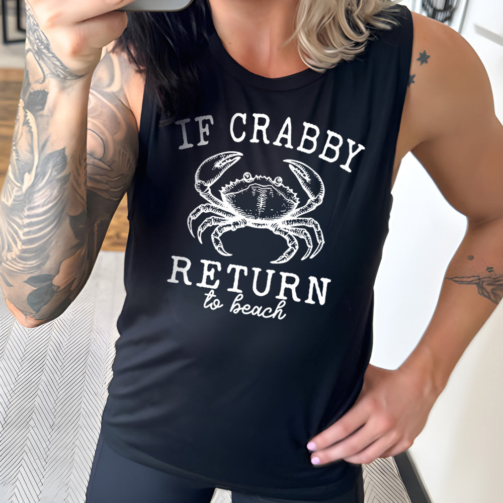 Model wearing black colored muscle tank with a crab graphic on it that says "If Crabby Return to Beach"