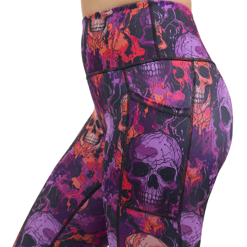 purple and orange skull patterned leggings