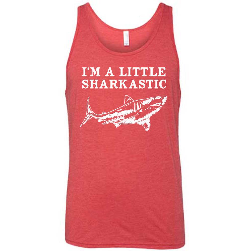 red unisex tank with the words "I'm a little sharkastic" on it, over the graphic of a shark
