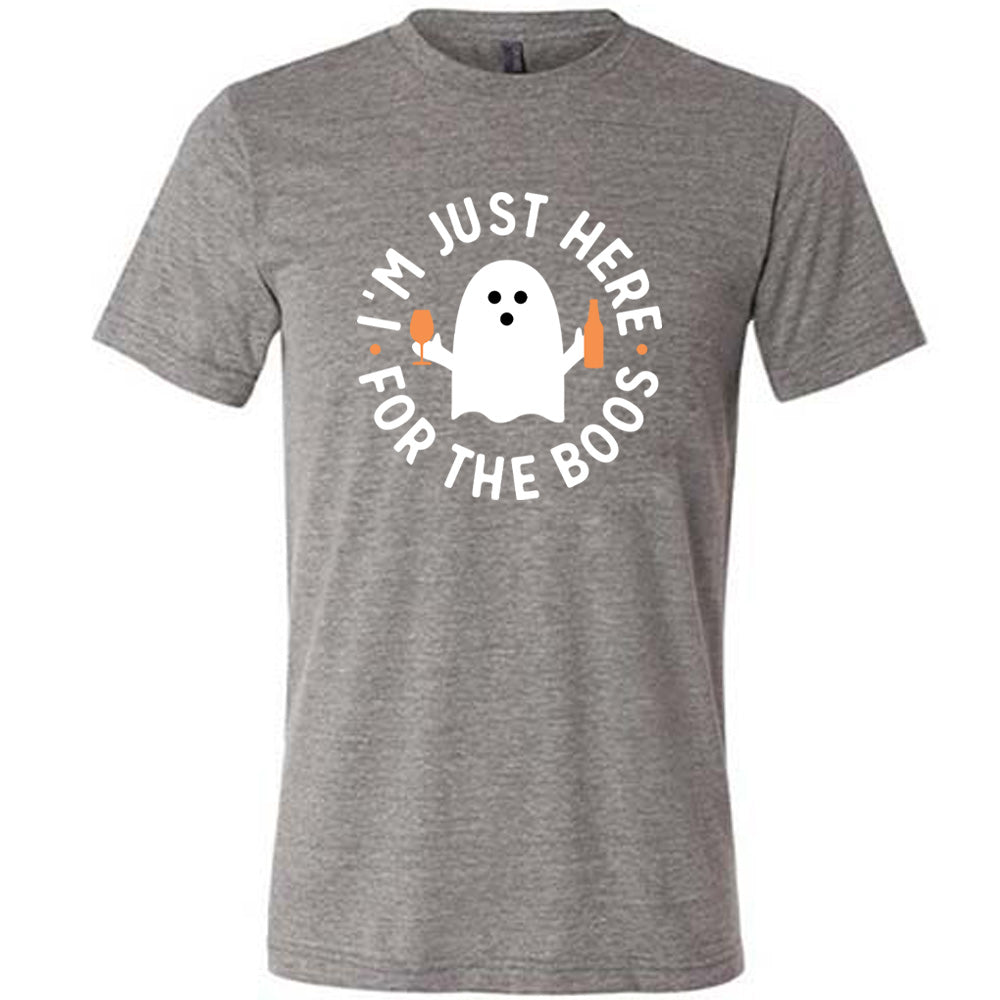Grey colored shirt with ghost holding wine glass and bottle graphic on it that says "I'm Just Here For The Boos"