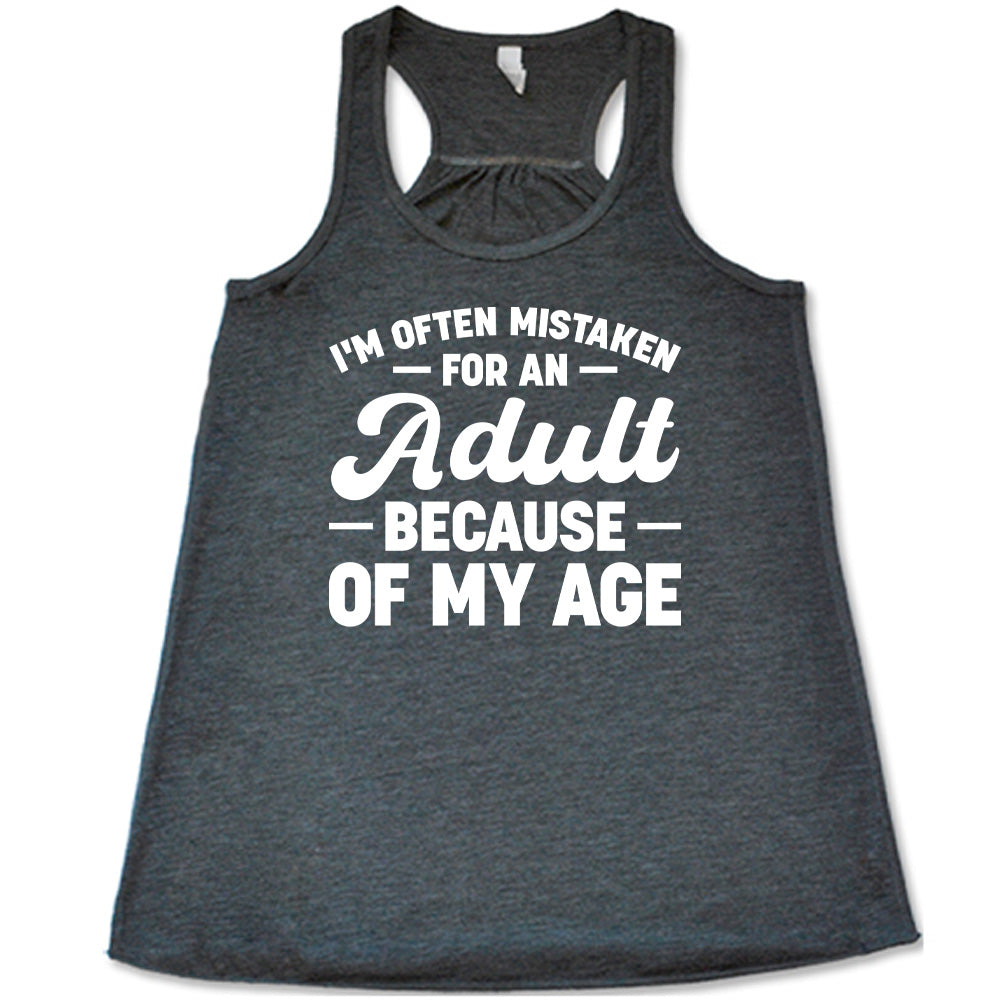 grey flowy tank with the words "I'm often mistaken for an adult because of my age" on it
