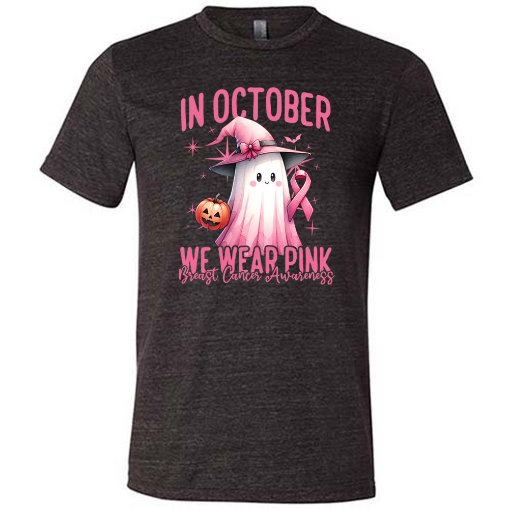Black shirt with pink ghost design and breast cancer awareness message on a white background