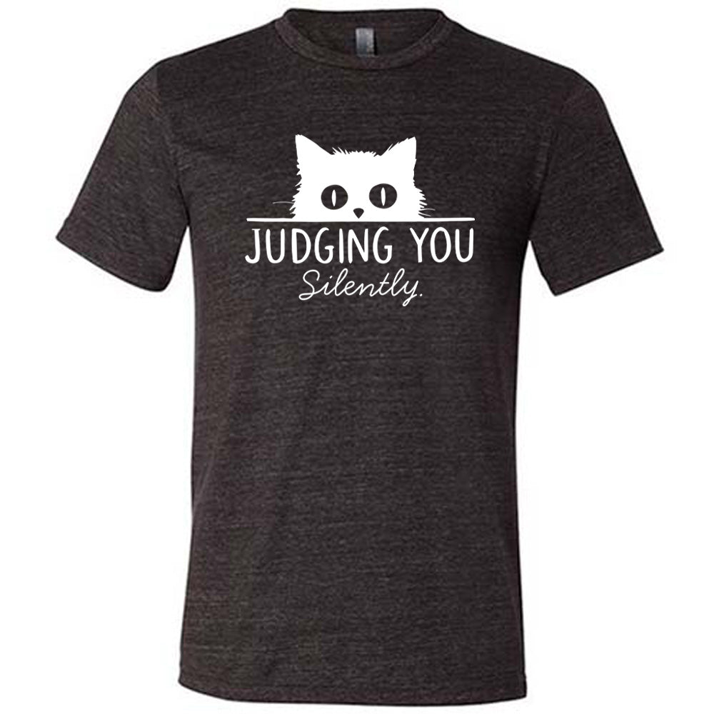 Black colored shirt with cat graphic on it that says "Judging You Silently" 