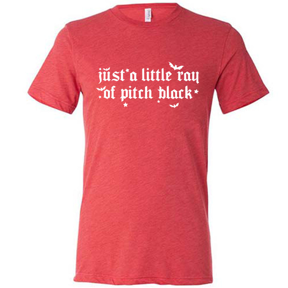red unisex tee with the words "just a little ray of pitch black" on it in a medieval font, with little bats and stars accenting the words