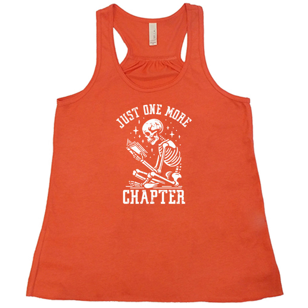 coral shirt with the text "Just One More Chapter" on it