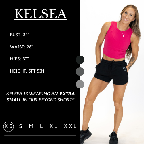Model's measurements of 32 inch bust, 28 inch waist, 37 inch hips, and height of 5 foot 5 inches. She is wearing a size extra small in these shorts.