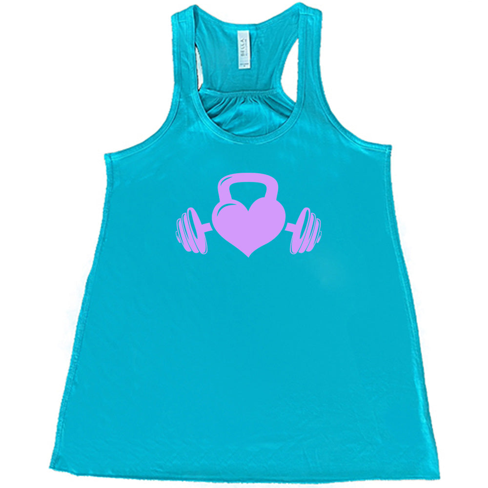 teal shirt with a light purple Kettlebell Heart graphic on it