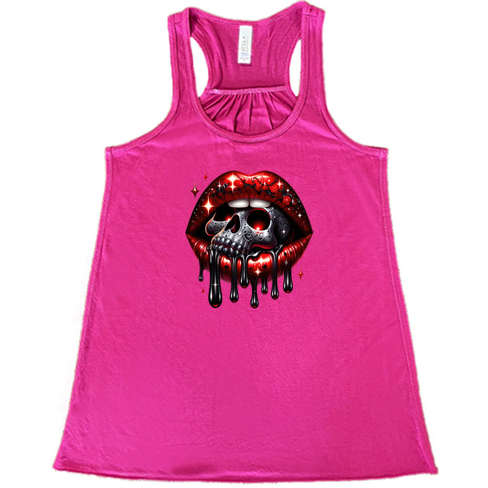 berry shirt with a skull and lip graphic on it