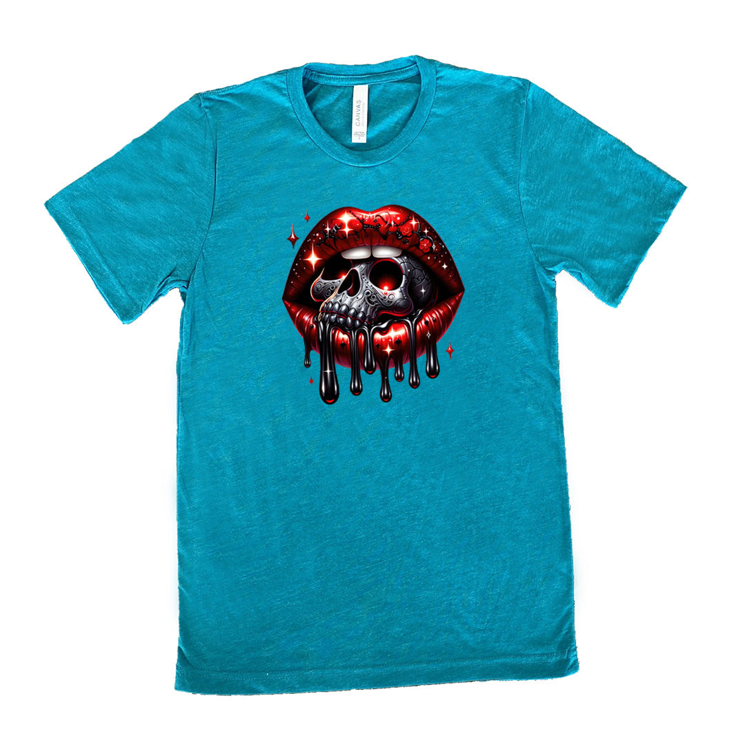 teal shirt with a skull and lip graphic on it