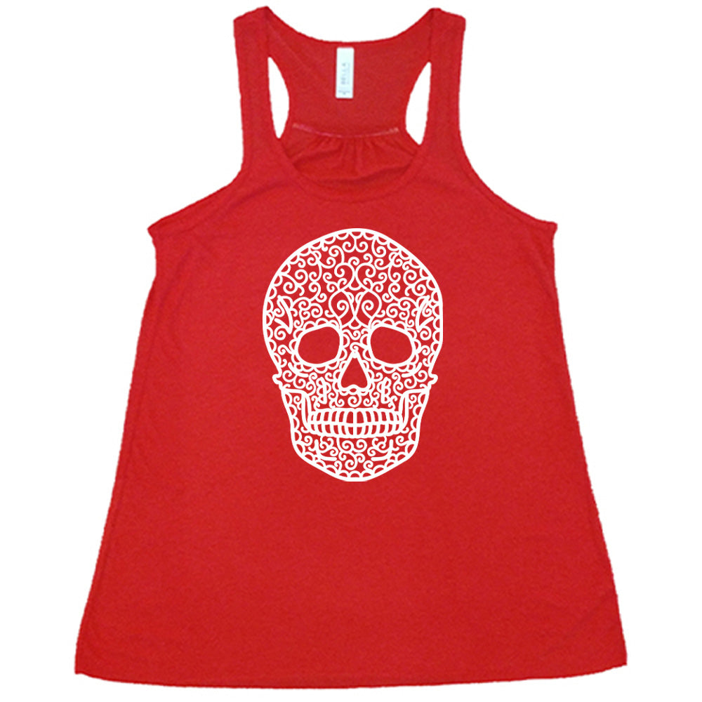 red flowy tank with the graphic of a large lacy skull