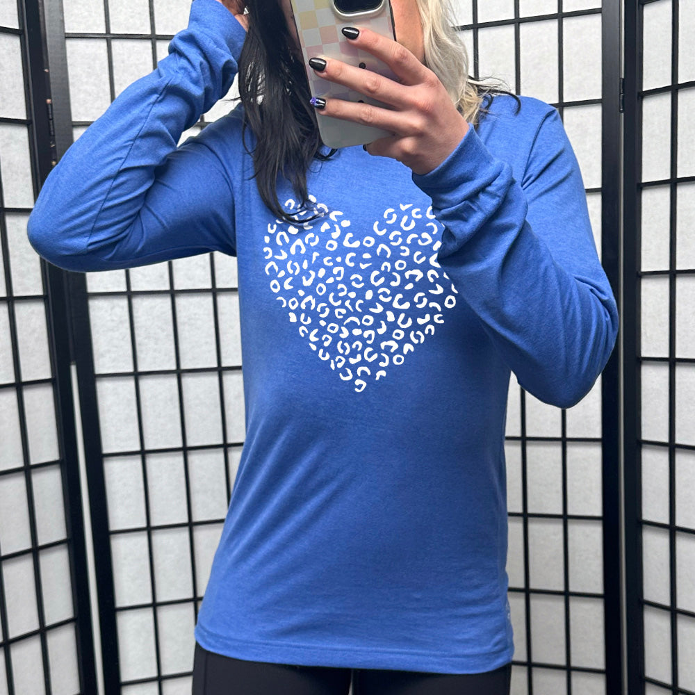 heather true royal long sleeve shirt with the graphic of a large heart made up of leopard print