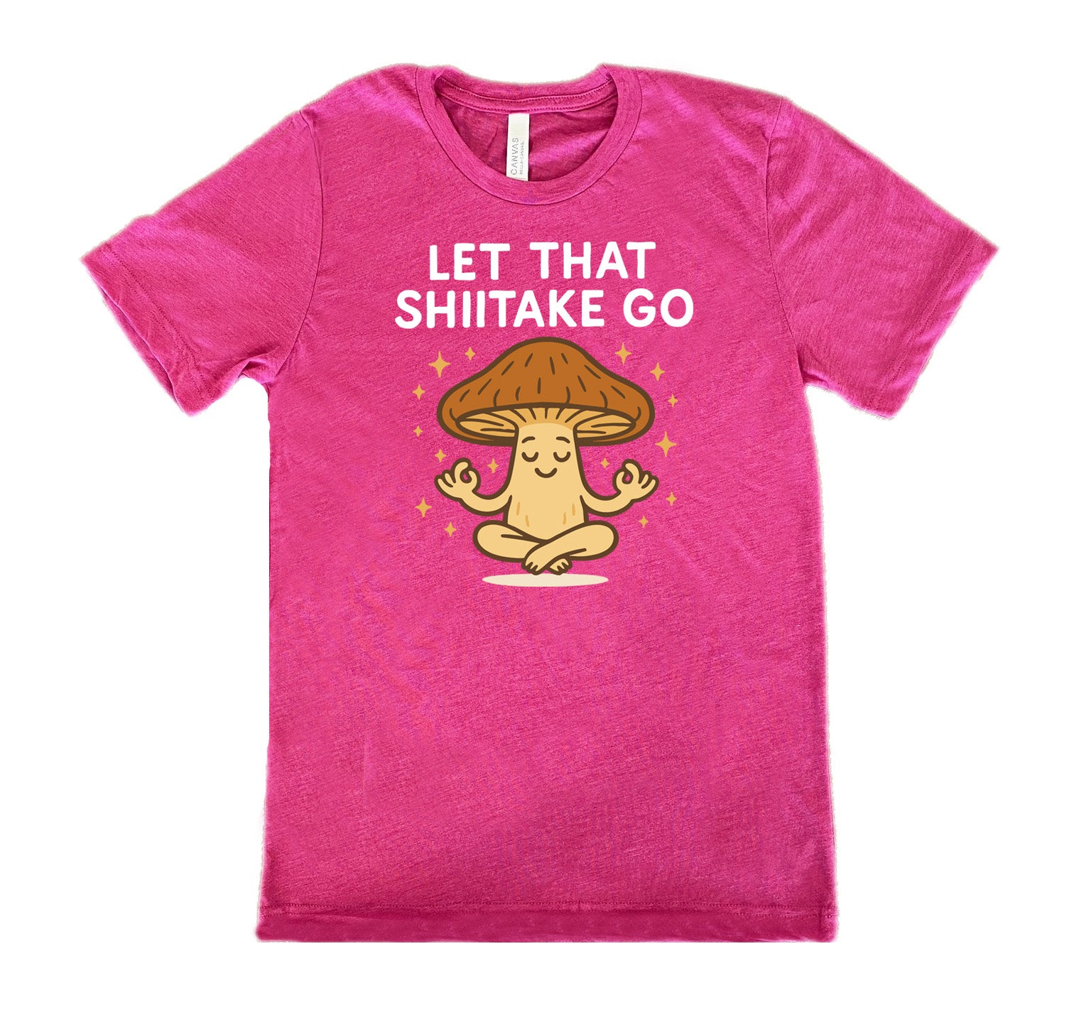 berry unisex tee with the words "let that shiitake go" on it and the graphic of a mushroom doing a yoga pose, surrounded by little stars