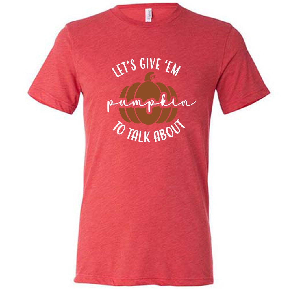 Red colored shirt with pumpkin graphic on it that says "Let's Give 'Em Pumpkin To Talk About"