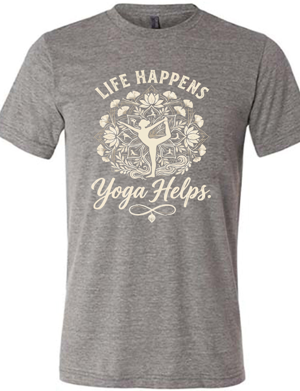 grey unisex tee with the words "life happens yoga helps." on it, around the graphic of a woman's silhouette doing a yoga pose in the middle of a elaborate pattern of shapes, lotuses and other plants