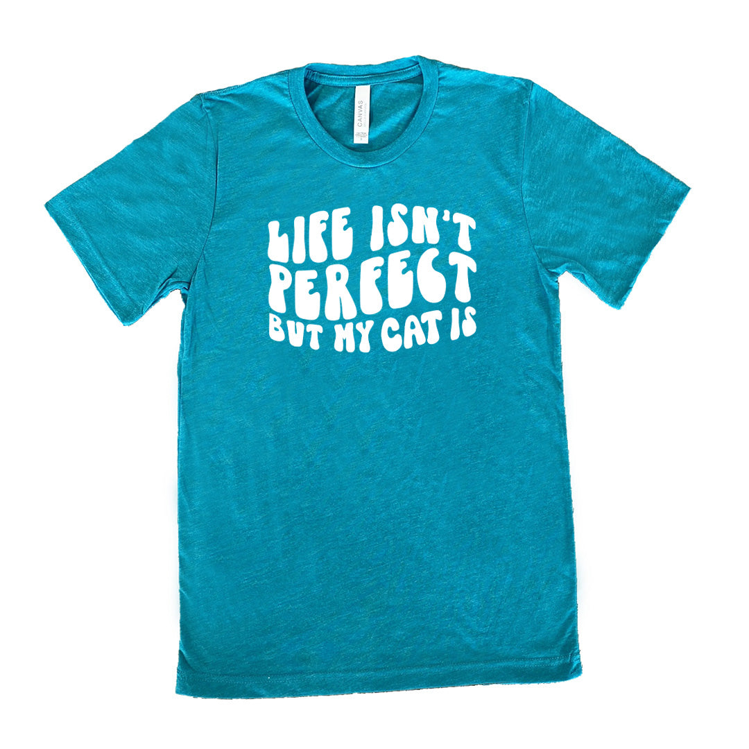 Teal colored shirt with graphic on it that says "Life Isn't Perfect But My Cat Is"