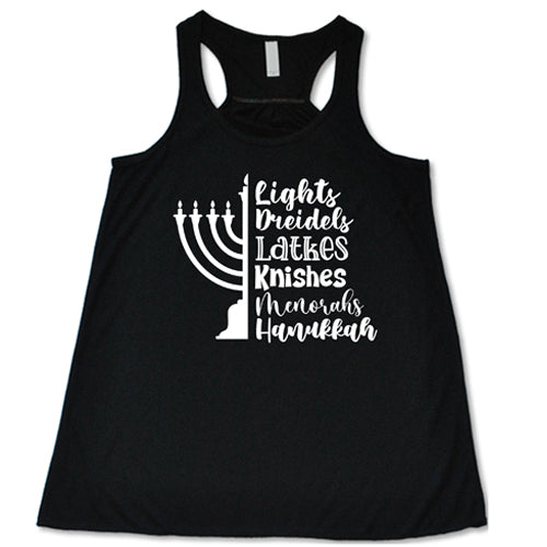 black racerback shirt that says "Lights, Dreidels, Latkes, Knishes, Menorahs, Hanukkah" in white
