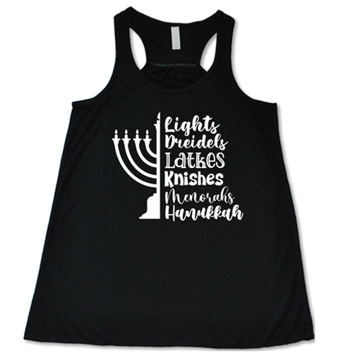 black racerback shirt that says "Lights, Dreidels, Latkes, Knishes, Menorahs, Hanukkah" in white