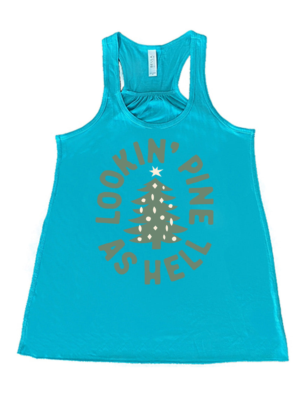 teal flowy racerback tank with the graphic of a Christmas tree, surrounded in oval shape by words saying "lookin' pine as hell" in capital letters