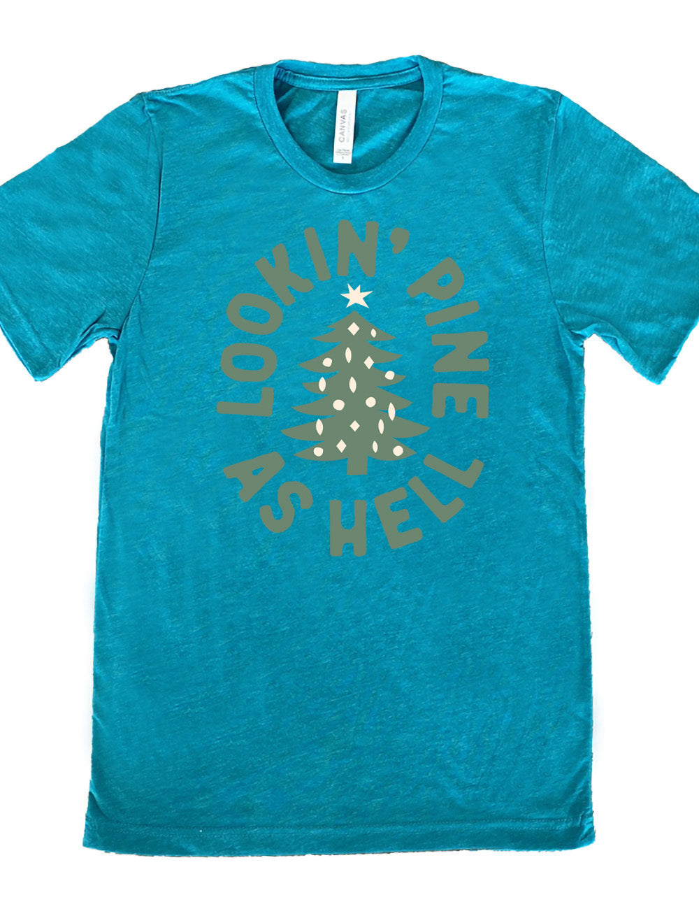 teal unisex tee with the graphic of a Christmas tree, surrounded in oval shape by words saying "lookin' pine as hell" in capital letters