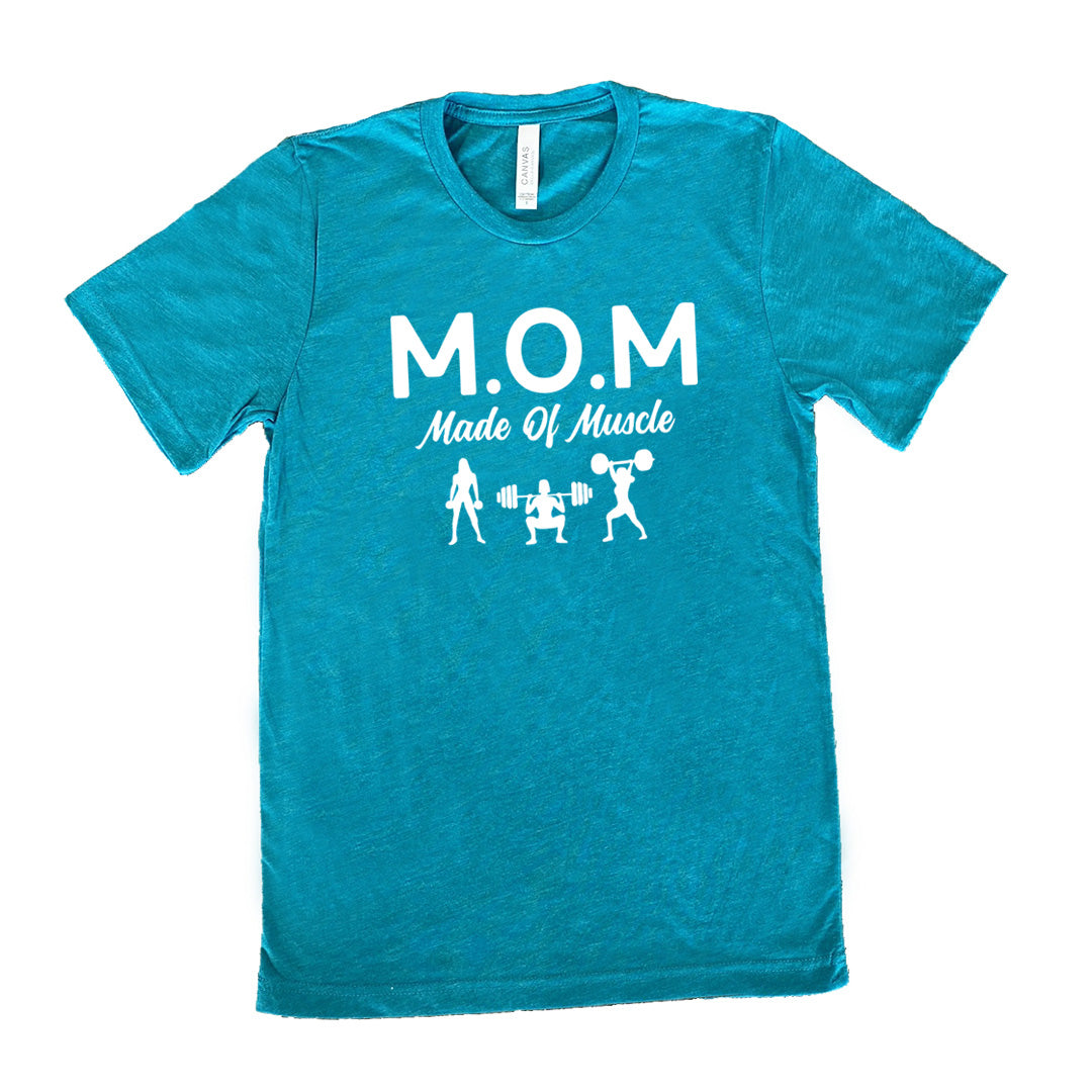 teal unisex tee with the word "mom" in large letters as an acronym for the smaller words below it saying "made of muscle", and the graphic of three female silhouettes holding weights