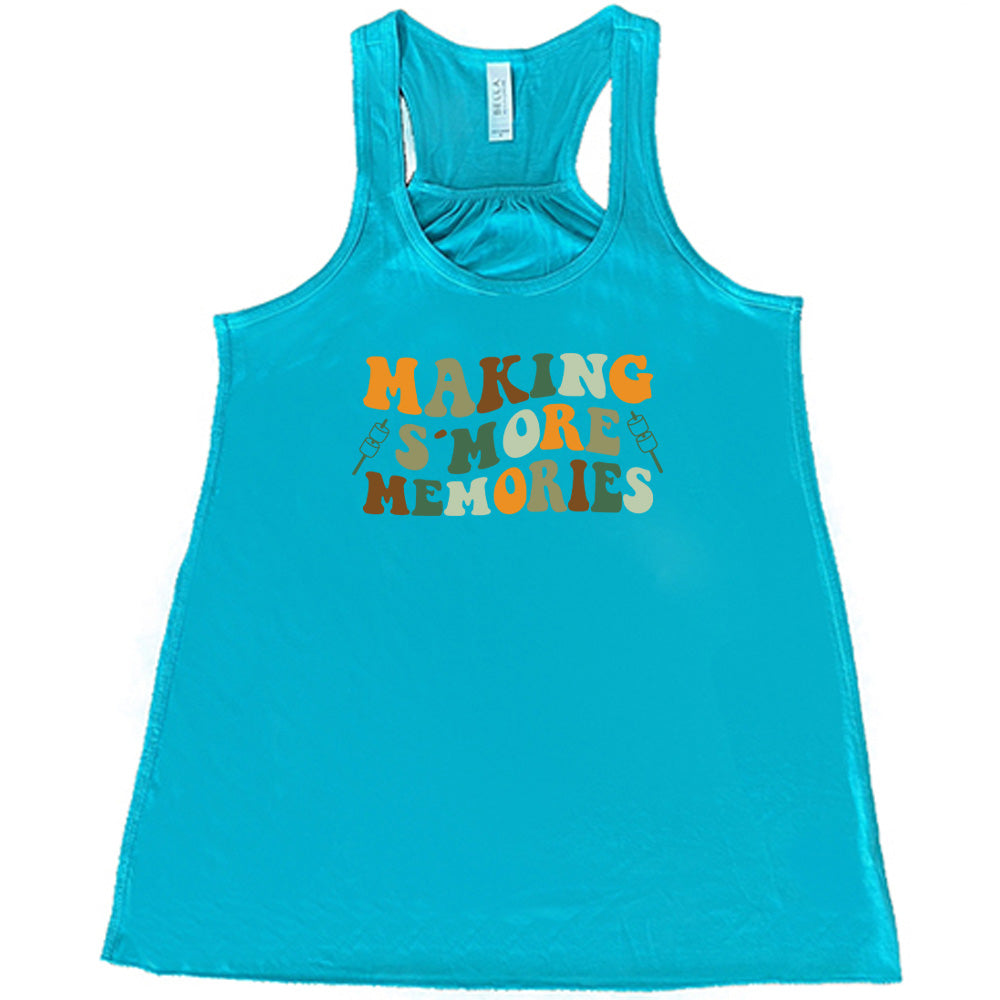 Teal colored flowy tank with a graphic on it that says "Making S'More Memories"