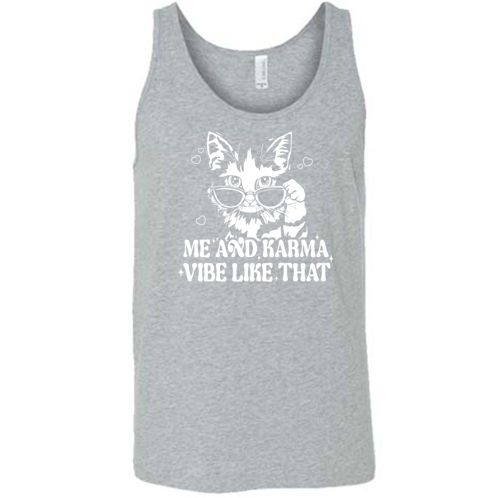 Grey colored tank with a cat wearing sunglasses graphic on it that says "Me and Karma Vibe Like That" 