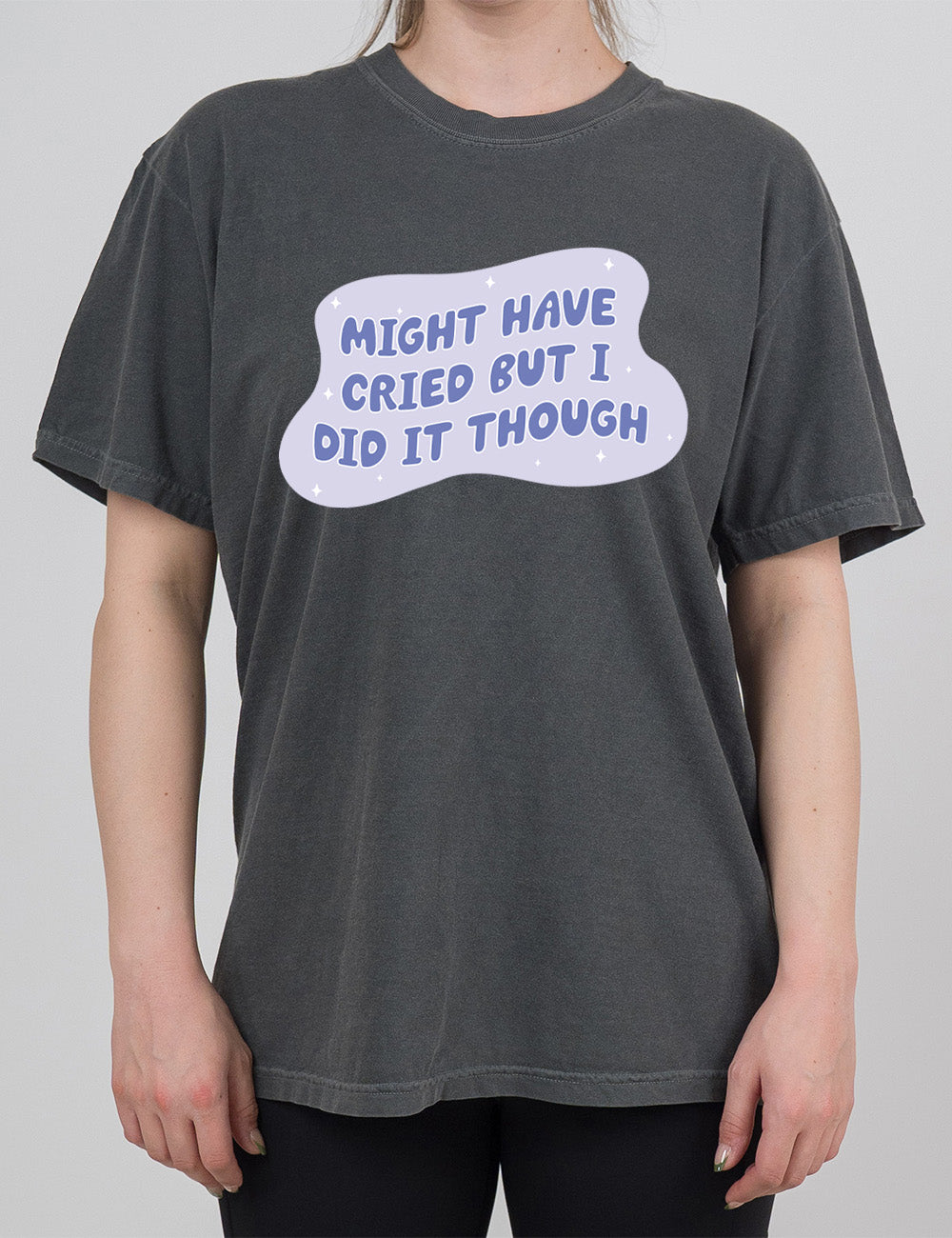 pepper modern tee with the words, within a blobby shape with a few stars, saying "might have cried but I did it though"