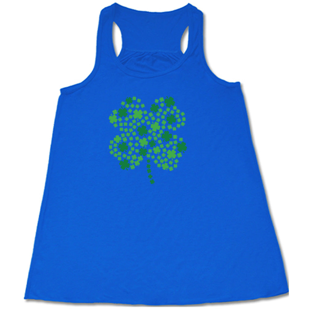 blue shirt with a shamrock graphic on it