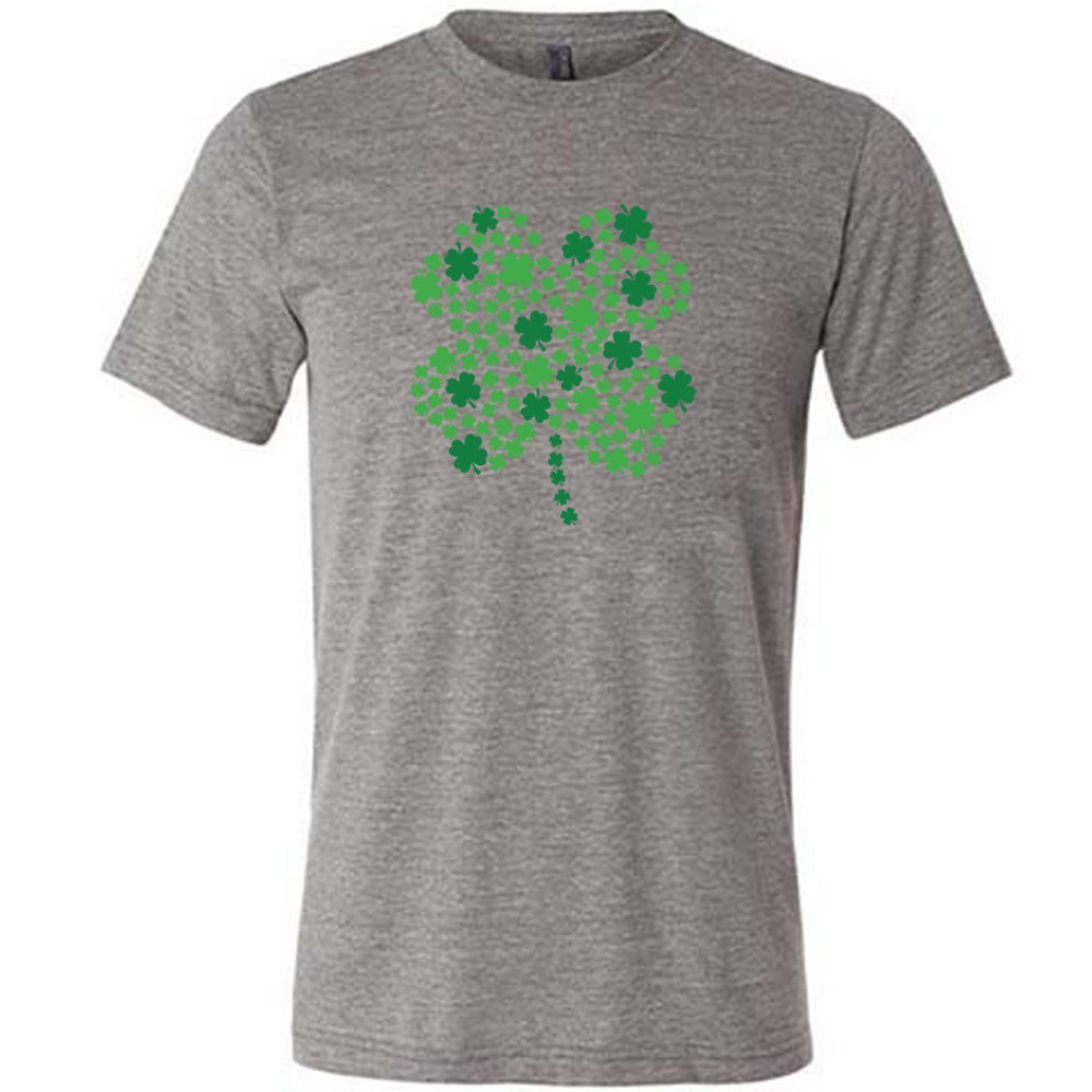 grey shirt with a shamrock graphic on it