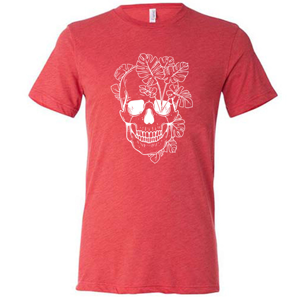 Red colored shirt with a monstera plant and skull graphic on it