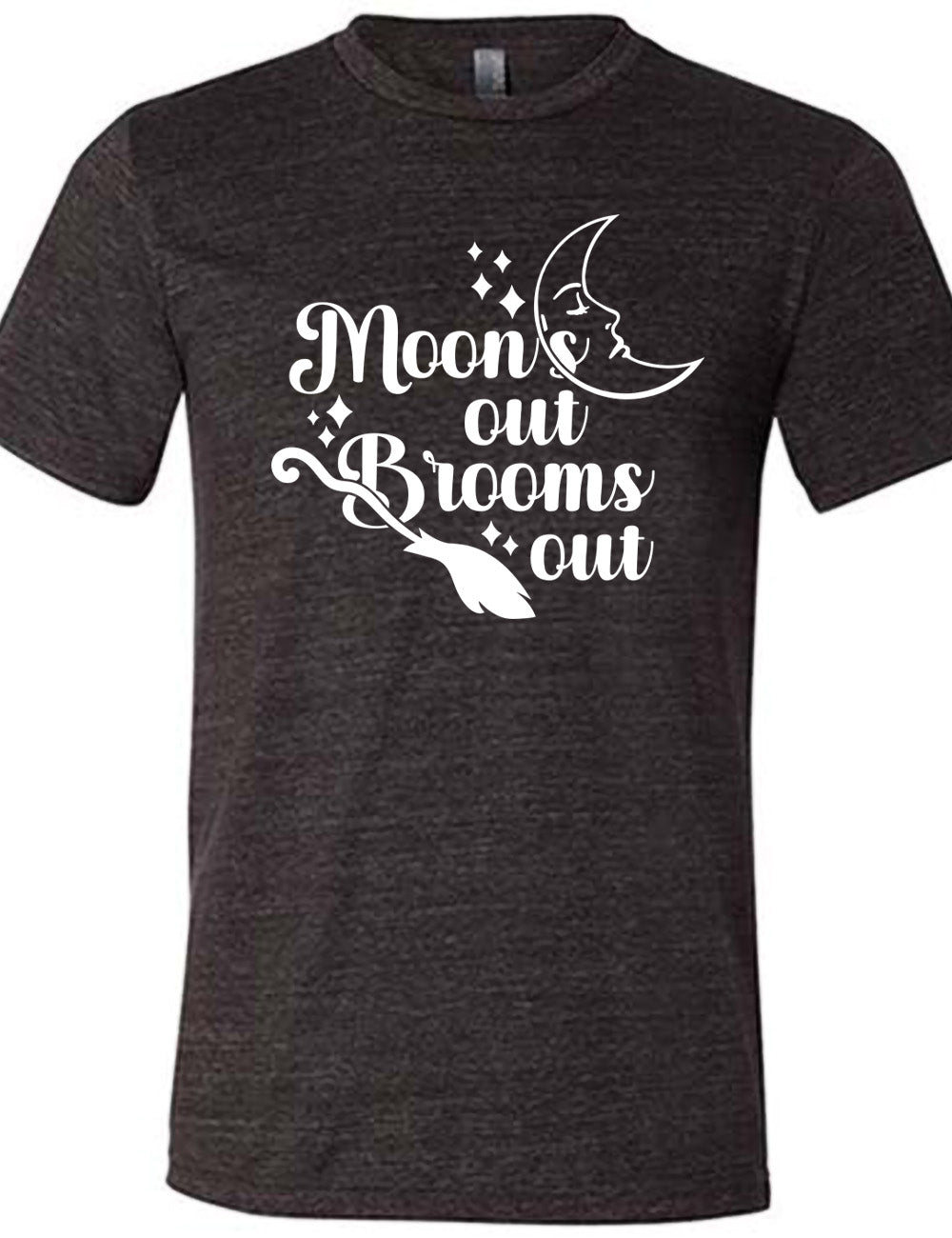 black unisex tee with the words "moon's out brooms out" on it, with the line graphic of a crescent moon, with a sleeping face, and the graphic of a broom, and a few scattered stars