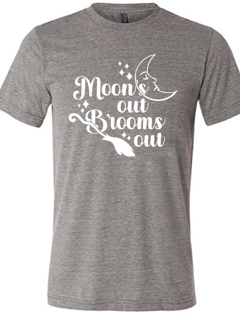 grey unisex tee with the words "moon's out brooms out" on it, with the line graphic of a crescent moon, with a sleeping face, and the graphic of a broom, and a few scattered stars